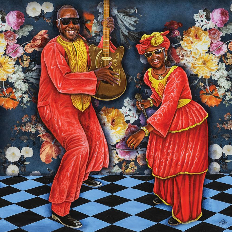 Amadou and Mariam - La Vie Est Belle. Portada del disco. Una mezcla de fotos e ilustración de los dos músicos cantando y tocando instrumentos.